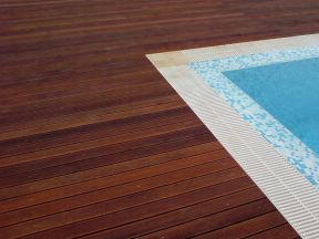 teak flooring around swimming pool